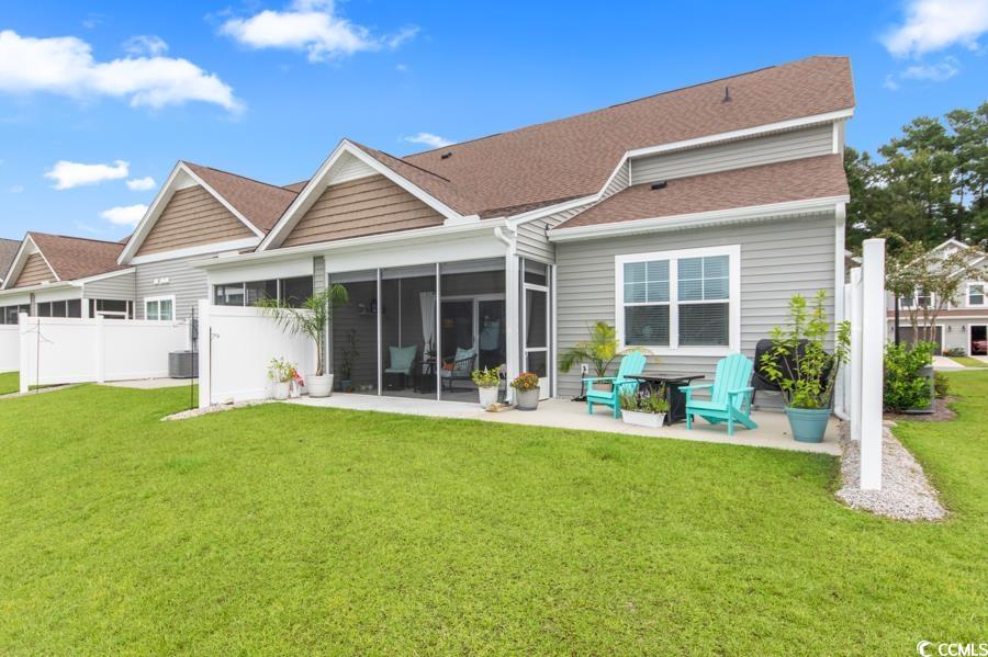 131 Machrie Loop, Unit A Myrtle Beach, SC 29588 - Photo 38 of 40 Rear view of property featuring a sunroom, a patio