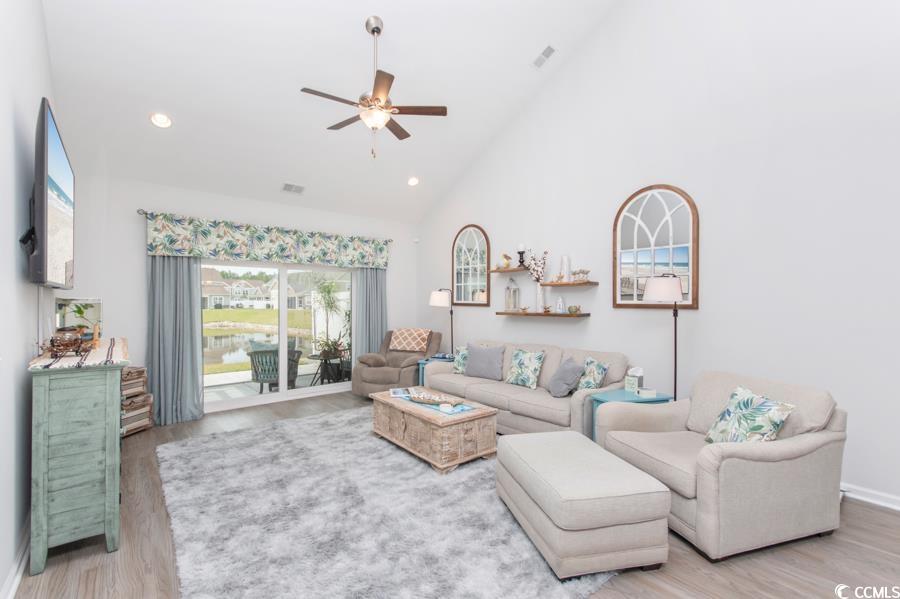 131 Machrie Loop, Unit A Myrtle Beach, SC 29588 - Photo 9 of 40 Living room with light wood-type flooring, ceiling