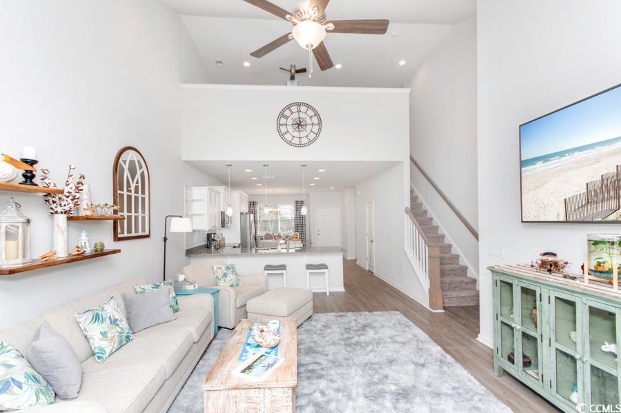 131 Machrie Loop, Unit A Myrtle Beach, SC 29588 - Photo 10 of 40 Living room featuring light wood-type flooring, ce