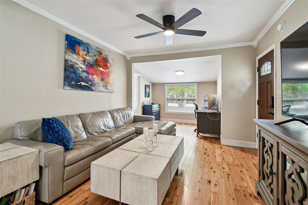 1722 Albemarle Road Clearwater, FL 33764 - Photo 11 of 50 a living room with furniture and a large window