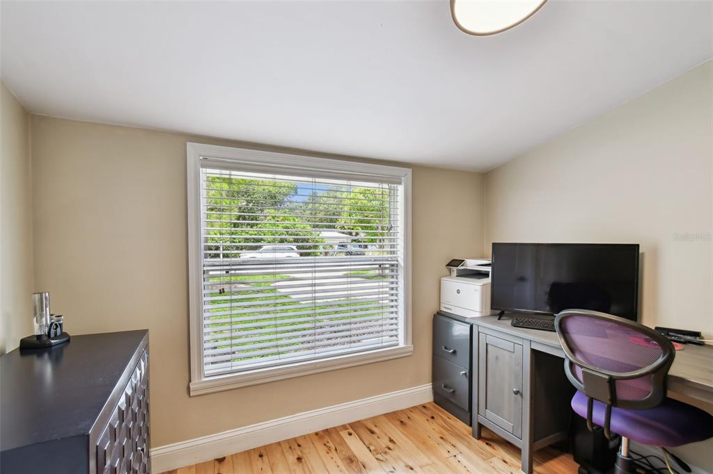 1722 Albemarle Road Clearwater, FL 33764 - Photo 20 of 50 a view of a workspace with furniture and a window