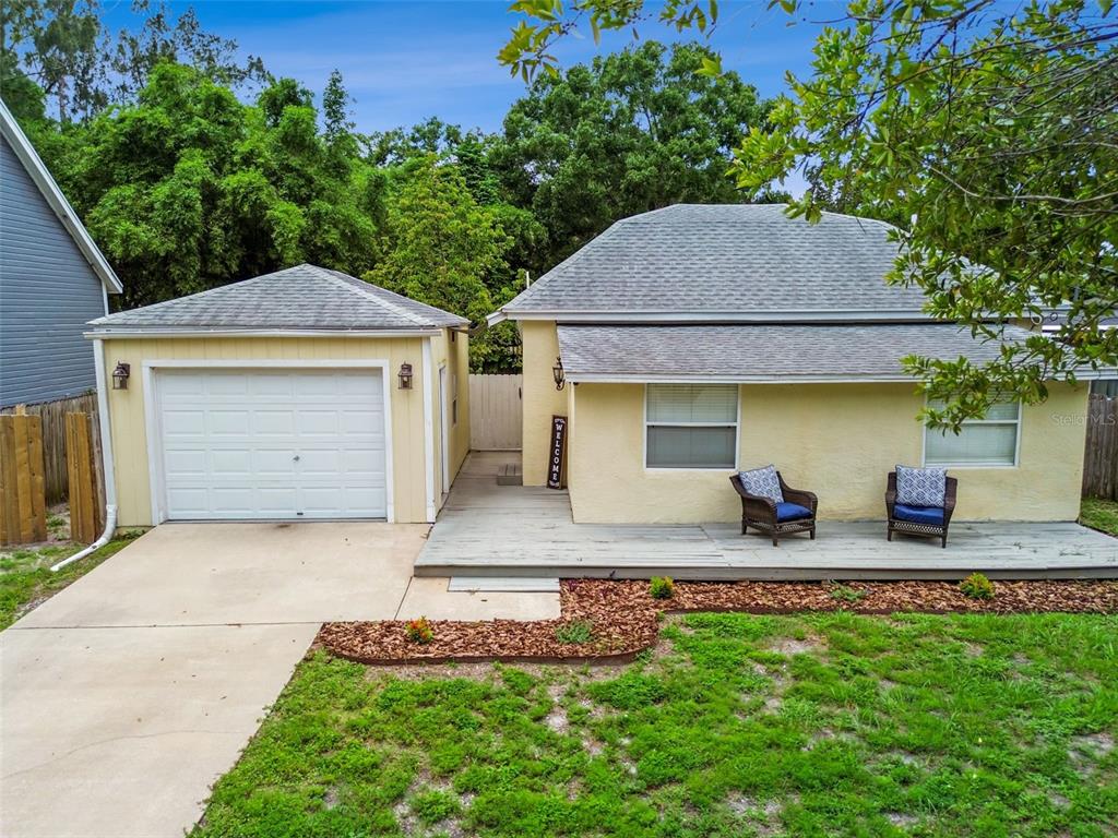 1722 Albemarle Road Clearwater, FL 33764 - Photo 2 of 50 a front view of a house with garden