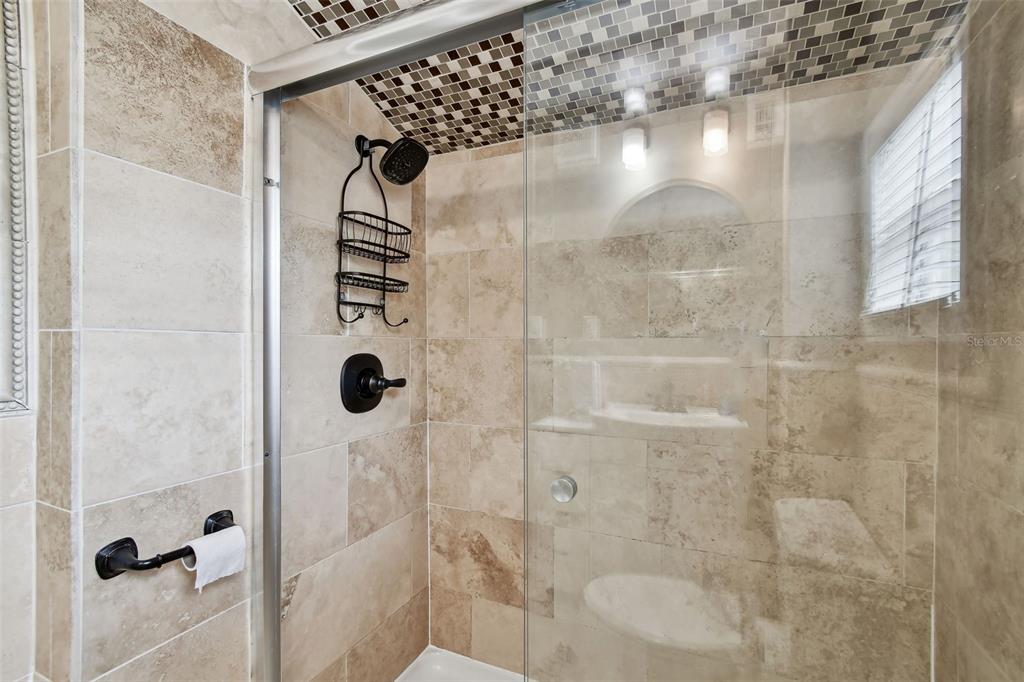 1722 Albemarle Road Clearwater, FL 33764 - Photo 32 of 50 a bathroom with a shower