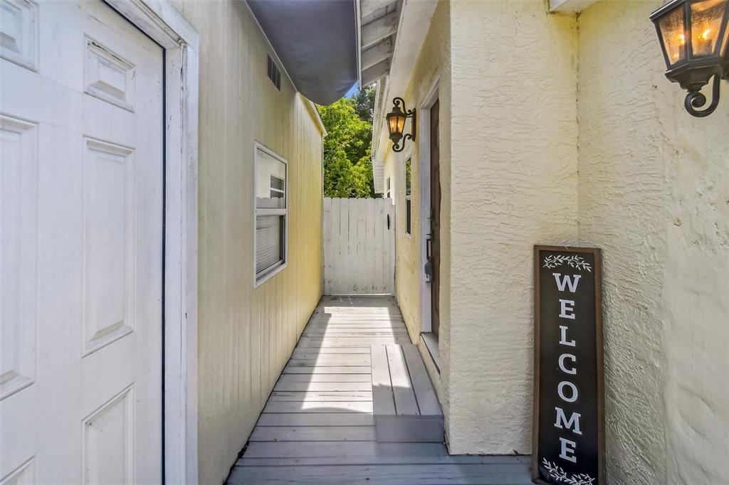 1722 Albemarle Road Clearwater, FL 33764 - Photo 37 of 50 a view of a hallway with wooden floor and staircase