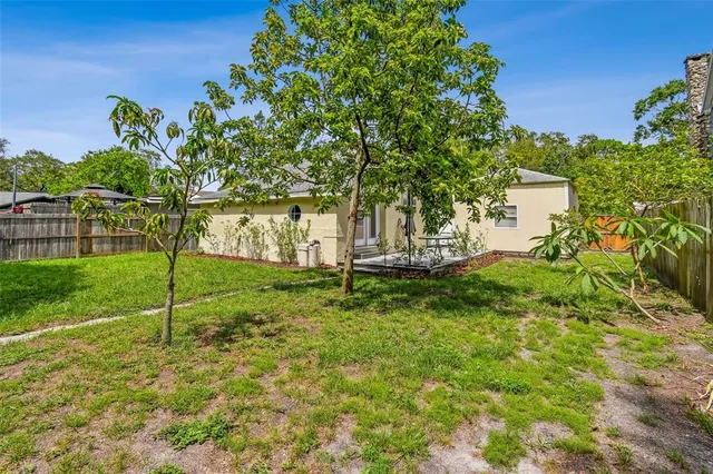 a view of a house with a big yard