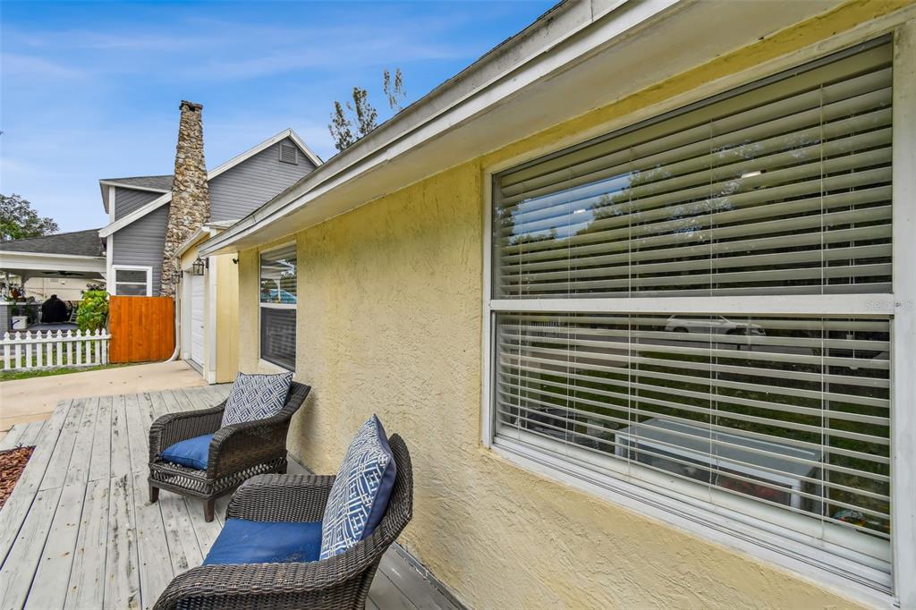 1722 Albemarle Road Clearwater, FL 33764 - Photo 5 of 50 a balcony with table and chairs