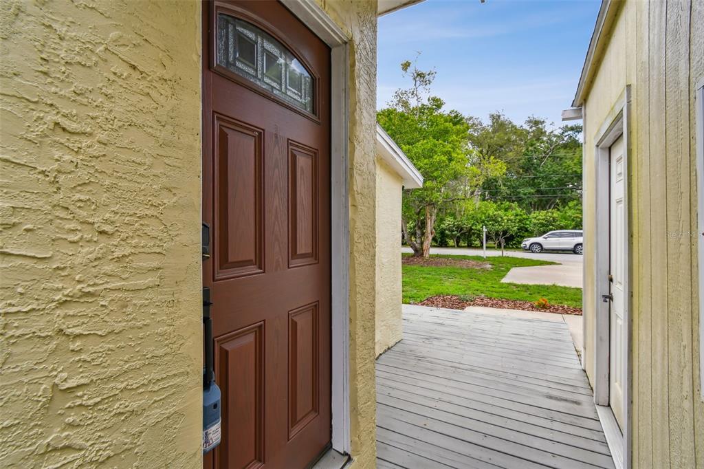 1722 Albemarle Road Clearwater, FL 33764 - Photo 7 of 50 a view of a door and brick walls