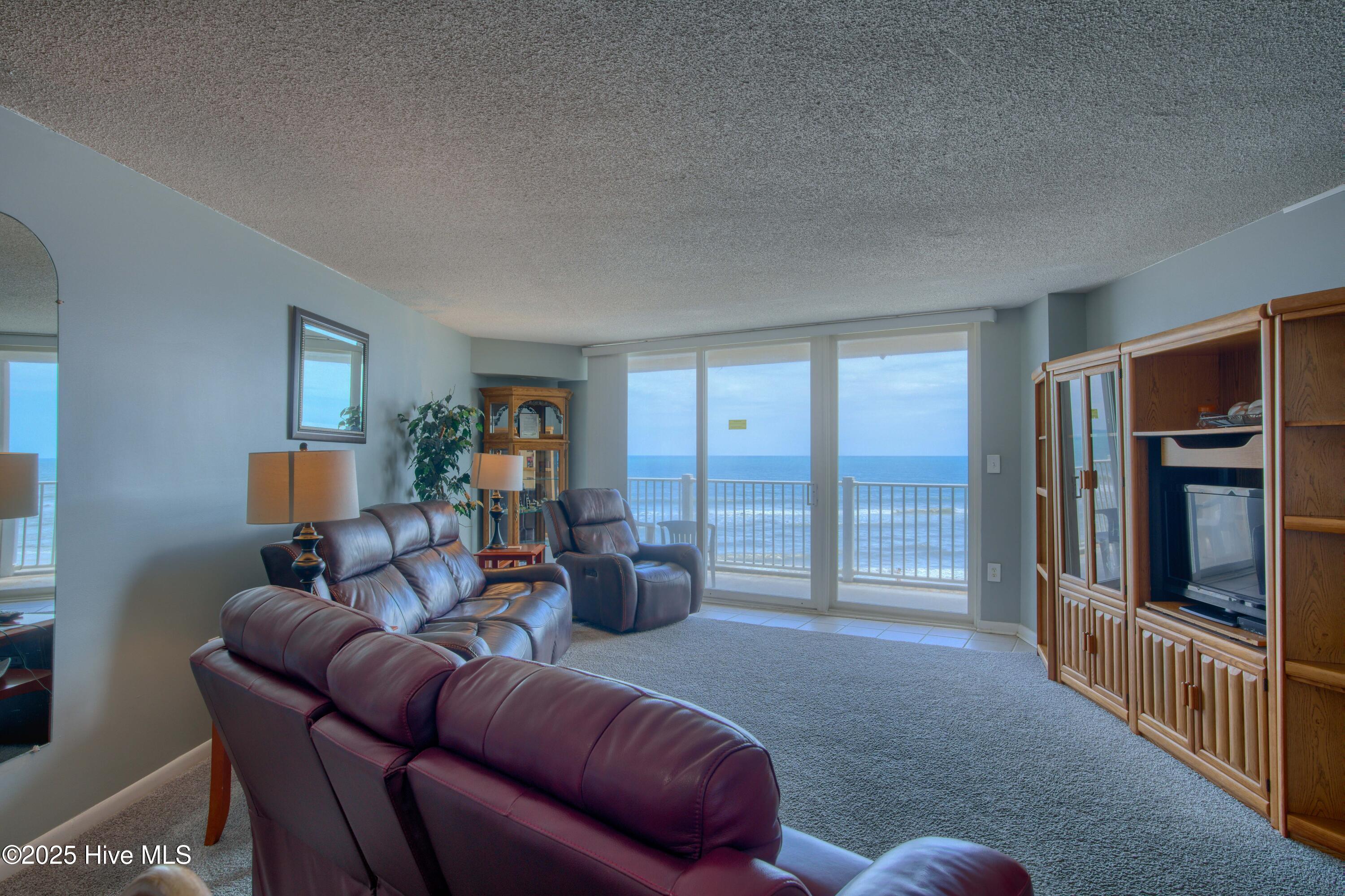 2000 New River Inlet Road, Unit 1207 North Topsail Beach, NC 28460 - Photo 18 of 30 1207 St. Regis - Living room and Bedroom