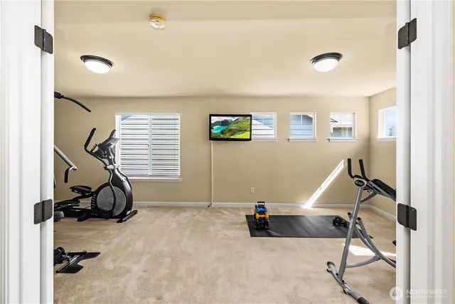 a view of a room with gym equipment