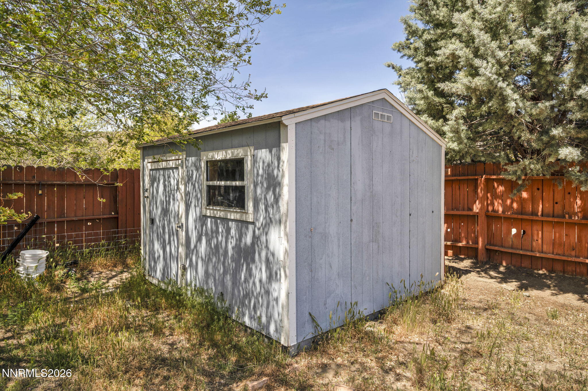 17615 Baileyville Court Reno, NV 89508 - Photo 18 of 19 a backyard of a house