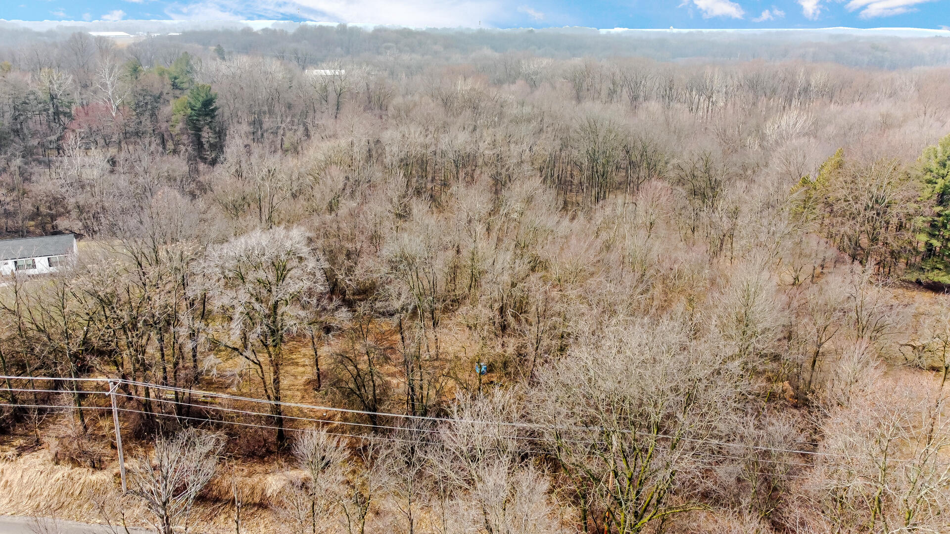 0 Timothy Road New Carlisle, IN 46552 - Photo 4 of 10 a view of a lake with mountains in the background