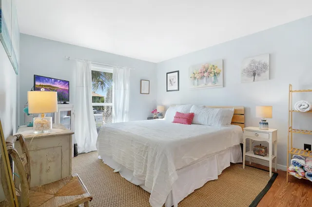 a bed room with a bed and a couch