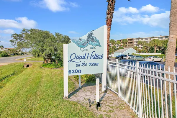 a view of a park with welcome board