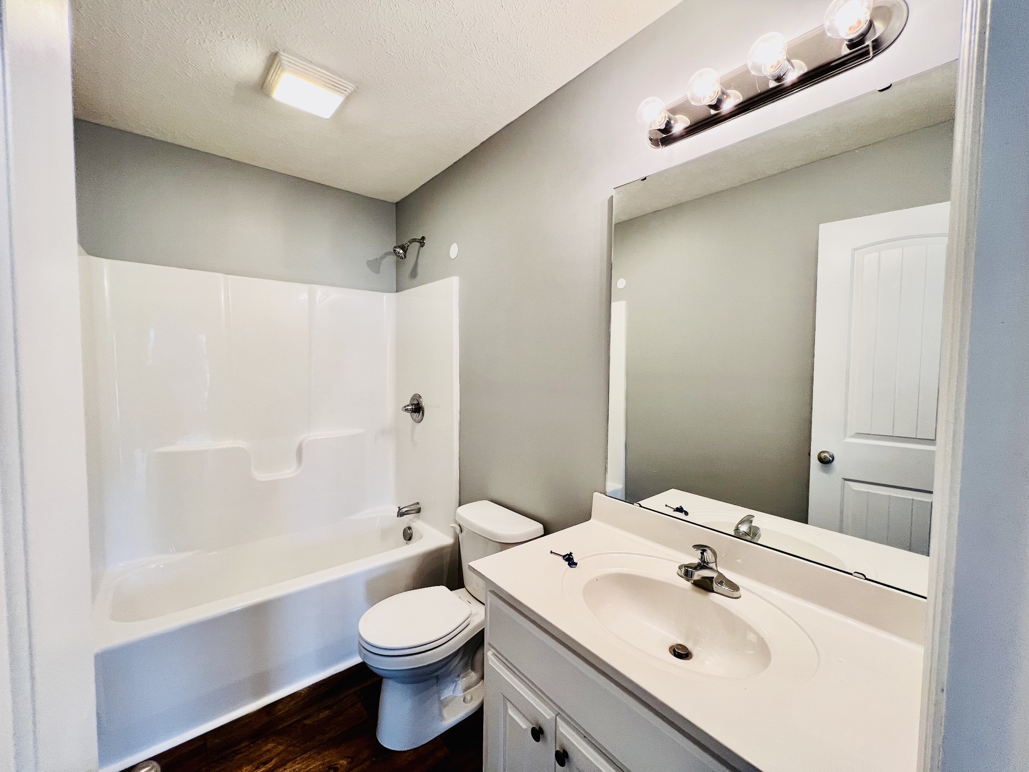 4861 Little Dry Creek Road Pulaski, TN 38478 - Photo 19 of 30 a bathroom with a sink a toilet and shower