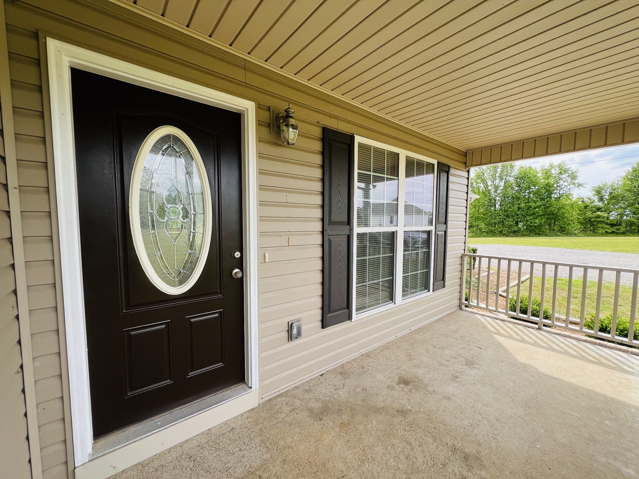 4861 Little Dry Creek Road Pulaski, TN 38478 - Photo 21 of 30 a front view of a house with a garden
