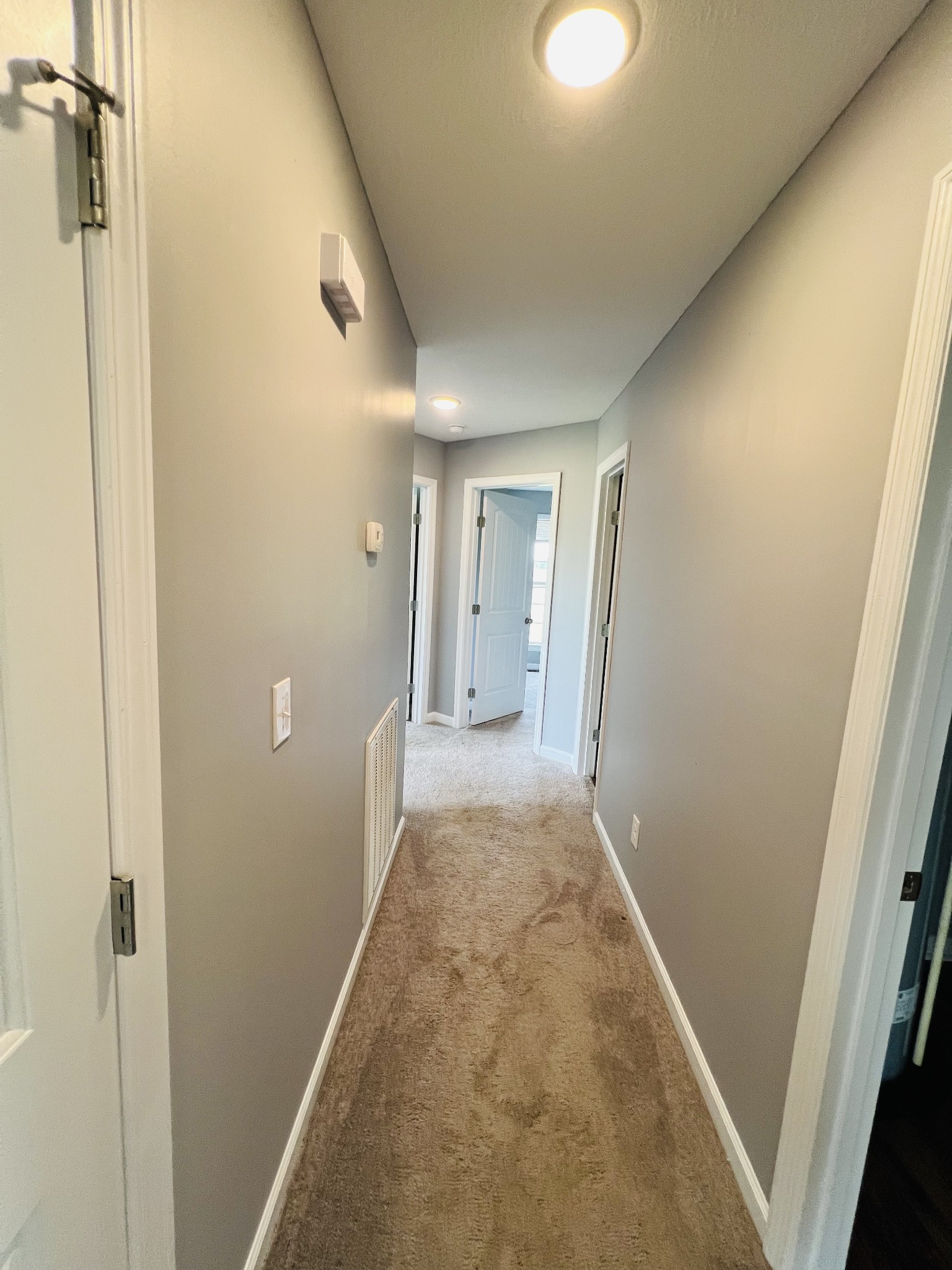 4861 Little Dry Creek Road Pulaski, TN 38478 - Photo 28 of 30 a view of a hallway with wooden floor and closet