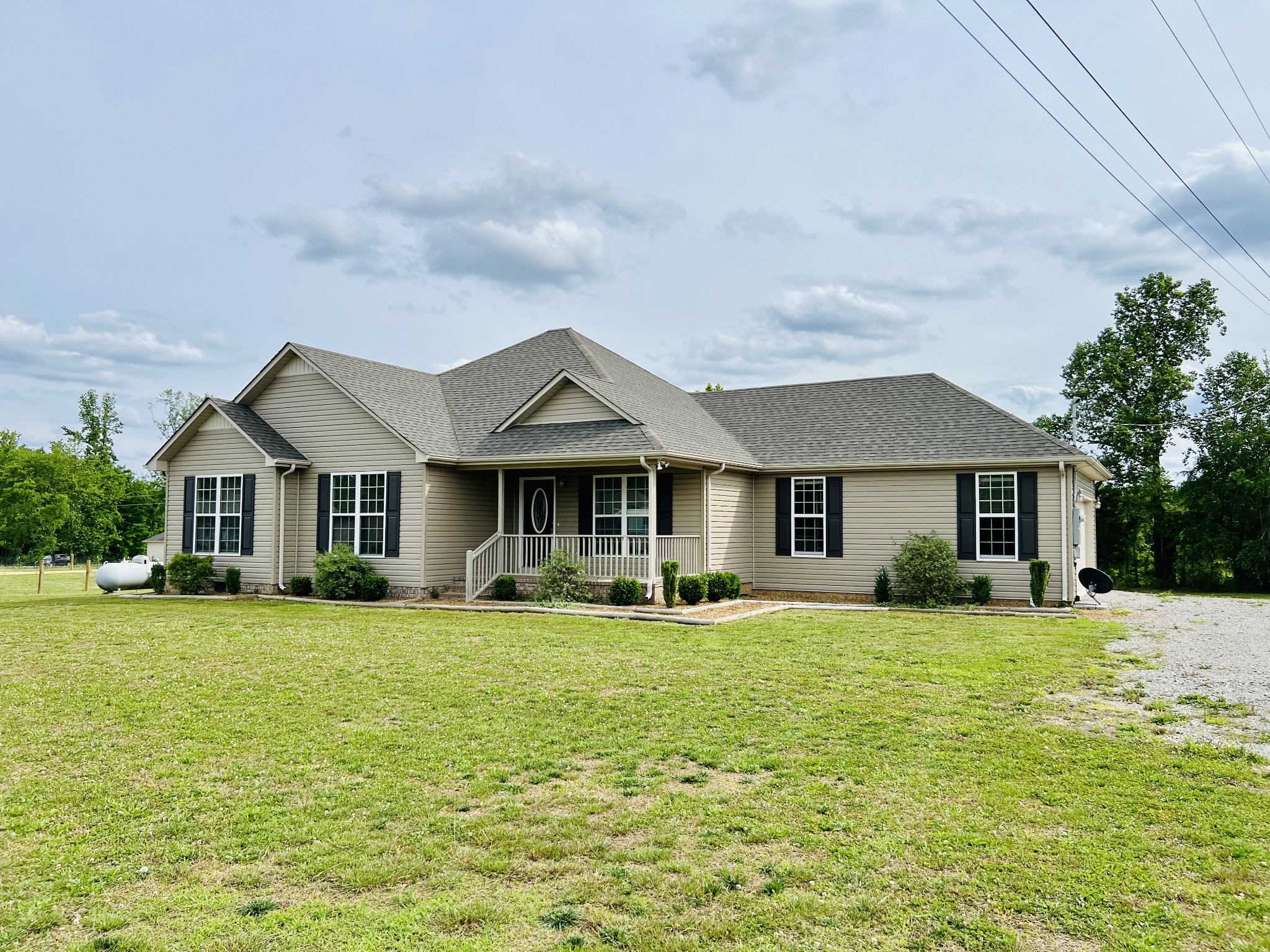 4861 Little Dry Creek Road Pulaski, TN 38478 - Photo 30 of 30 a front view of a house with a garden