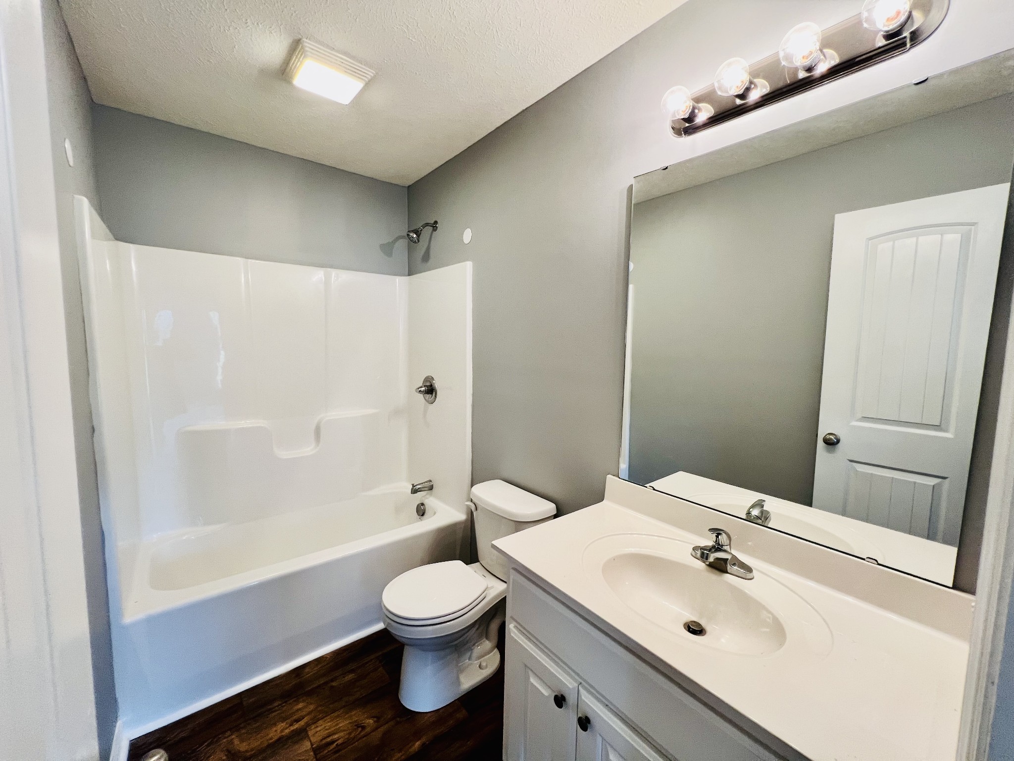4861 Little Dry Creek Road Pulaski, TN 38478 - Photo 8 of 30 a bathroom with a sink toilet and shower