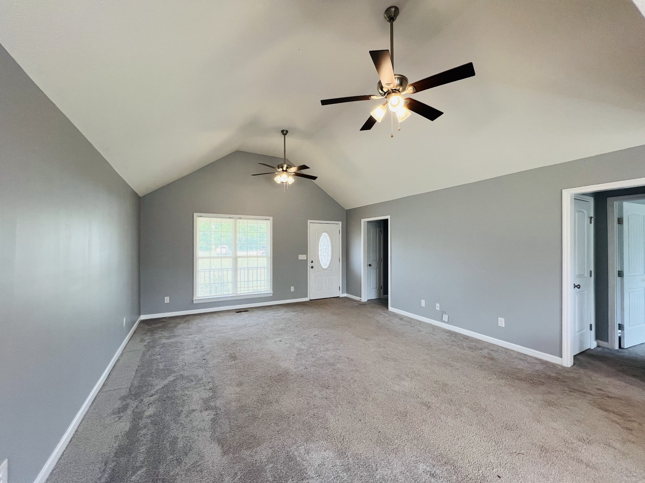 4861 Little Dry Creek Road Pulaski, TN 38478 - Photo 10 of 30 a view of a livingroom with a ceiling fan and window