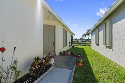 a view of living room and patio
