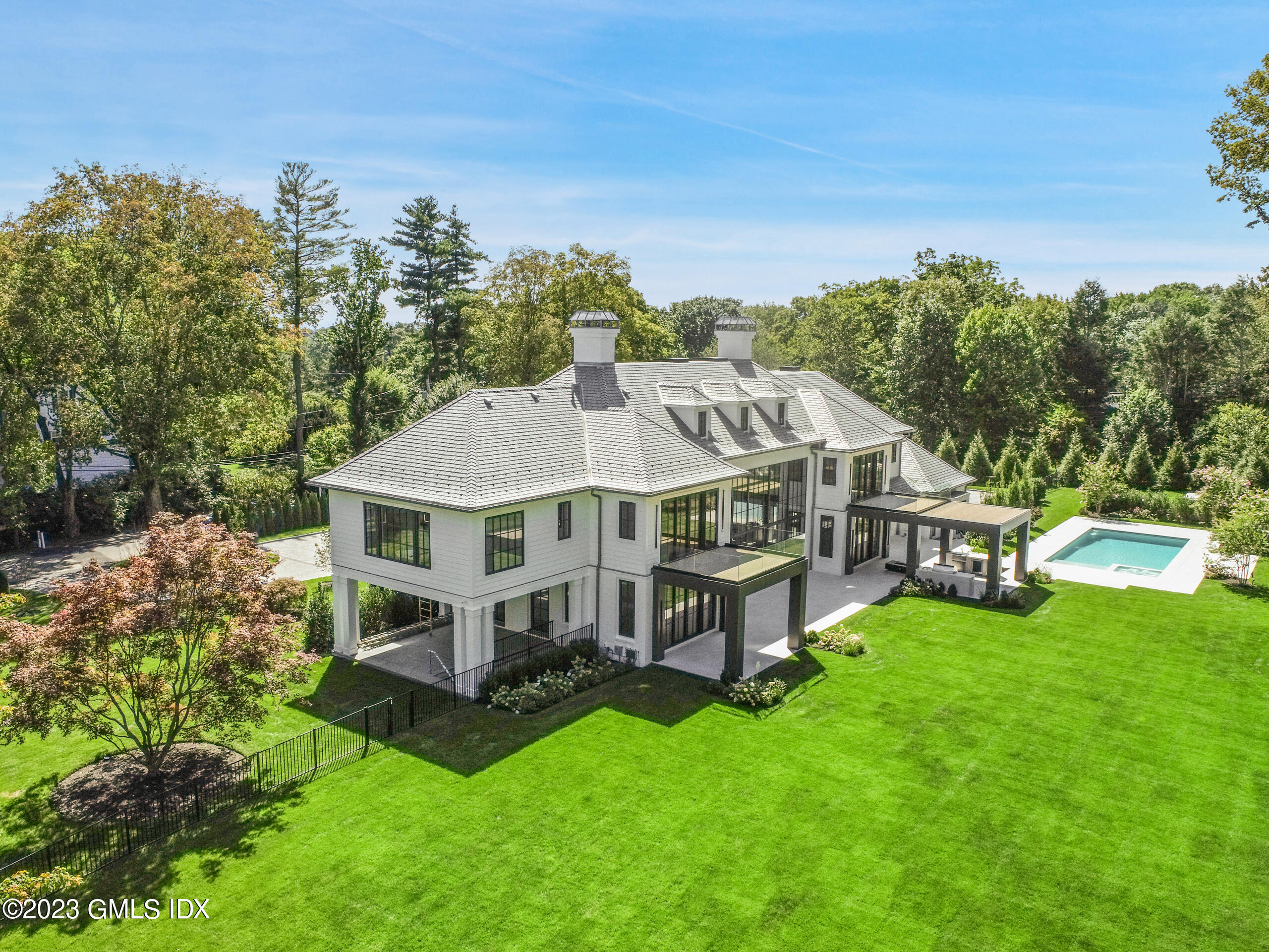 2 Midwood Road Greenwich, CT 06830 - Photo 12 of 12 an aerial view of a house with yard and tree s