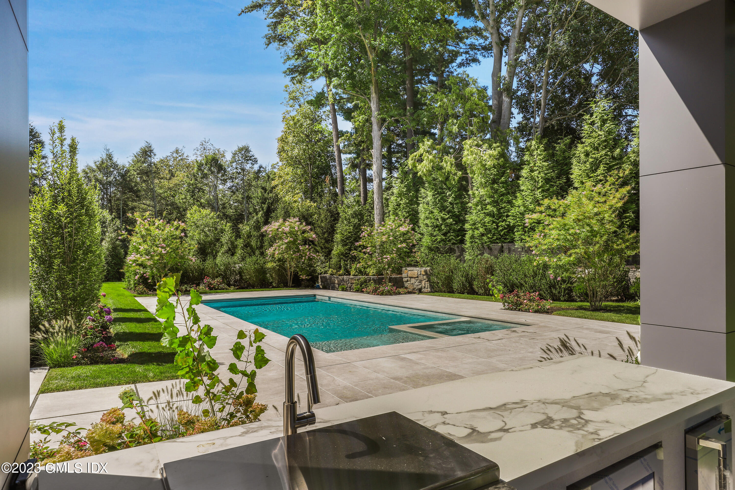 2 Midwood Road Greenwich, CT 06830 - Photo 7 of 12 a view of a backyard