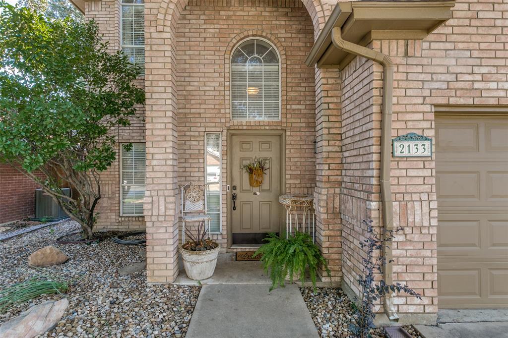 2133 Rim Rock Drive Keller, TX 76248 - Photo 3 of 37 View of exterior entry featuring brick siding