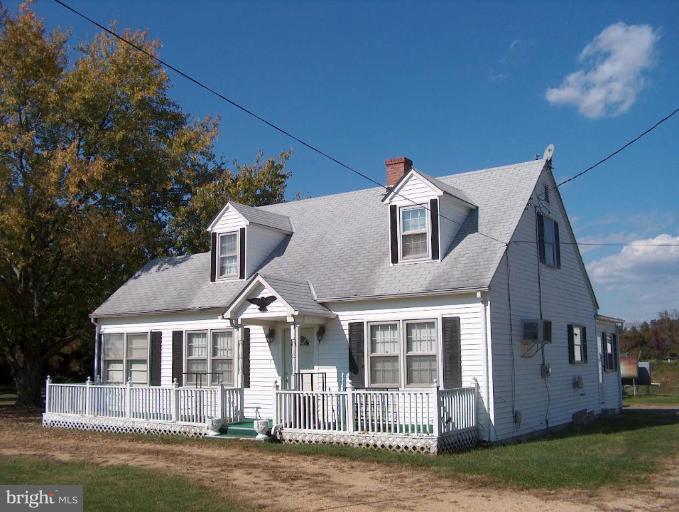 48680 Trapp Road St. Inigoes, MD 20684 - Photo 1 of 13 front view of a house with a porch