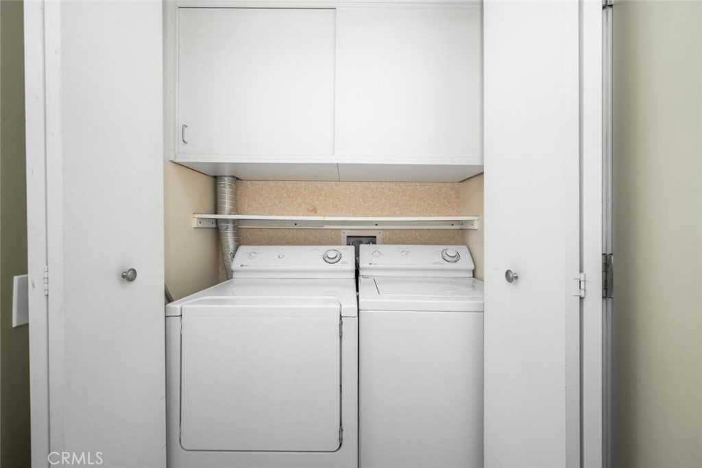 525 East Seaside Way, Unit 904 Long Beach, CA 90802 - Photo 32 of 58 a utility room with dryer and washer