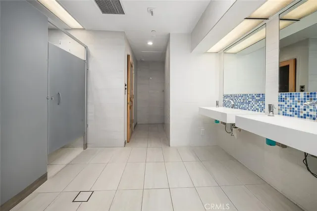 a view of a dining area with furniture and a chandelier