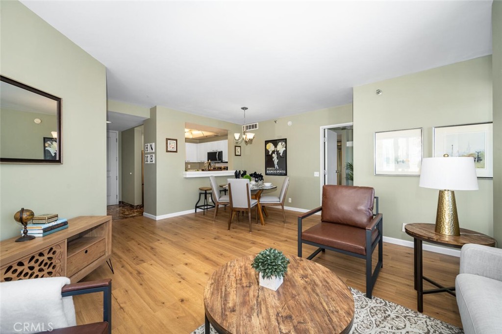 525 East Seaside Way, Unit 904 Long Beach, CA 90802 - Photo 5 of 58 a living room with furniture a rug and a table