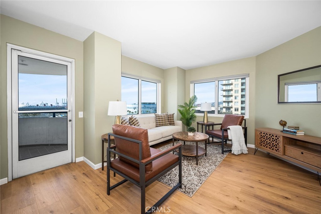 525 East Seaside Way, Unit 904 Long Beach, CA 90802 - Photo 7 of 58 a living room with furniture and a window