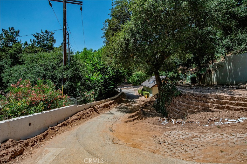 3597 Shaw Ranch Road Pasadena, CA 91107 - Photo 14 of 30 a view of a backyard with wooden fence