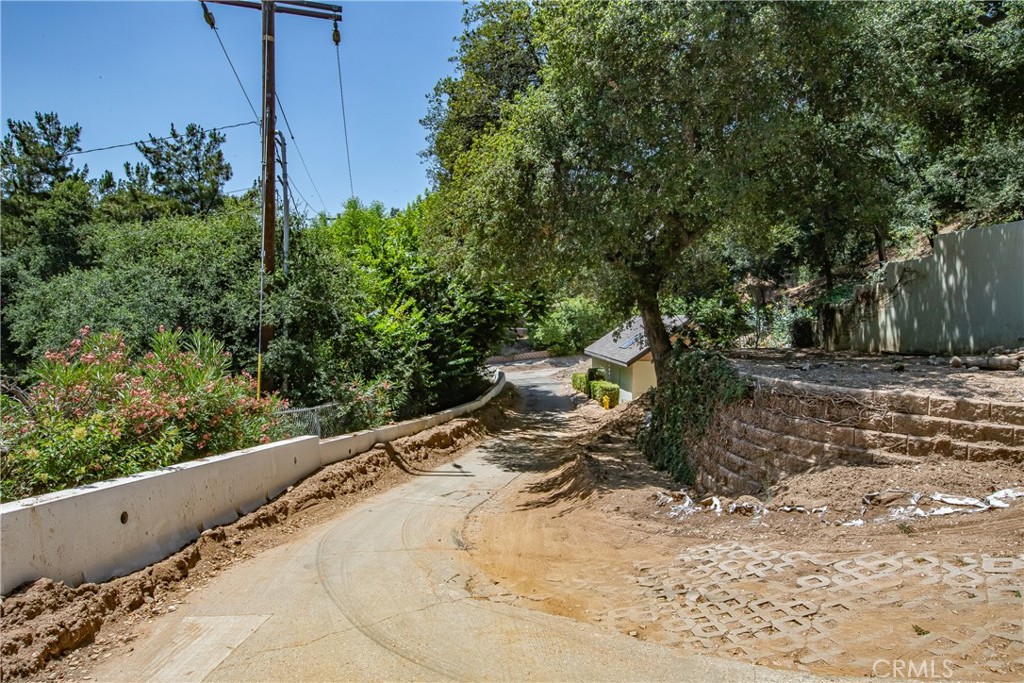 3597 Shaw Ranch Road Pasadena, CA 91107 - Photo 24 of 30 a view of a backyard with wooden fence