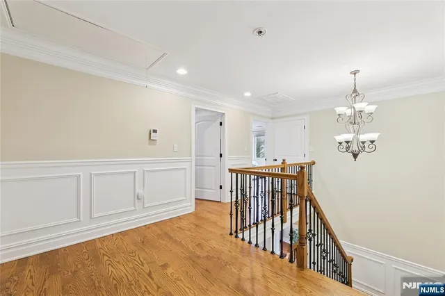 a bathroom with a double vanity sink a mirror and a