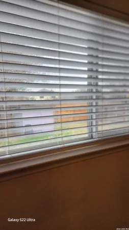 a view of a window and a lake view