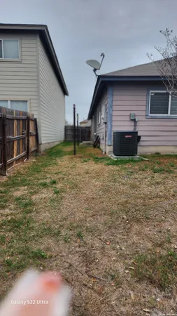 a house with yard in front of it