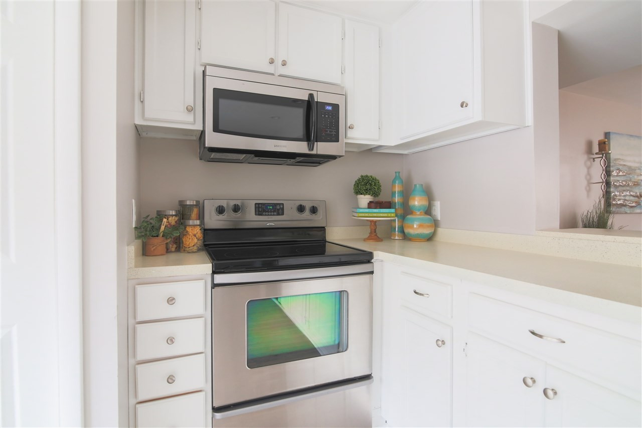 7705 Sandra Lane Raleigh, NC 27615 - Photo 6 of 12 Large counter with optional eat-in bar on opposite side. Kitchen