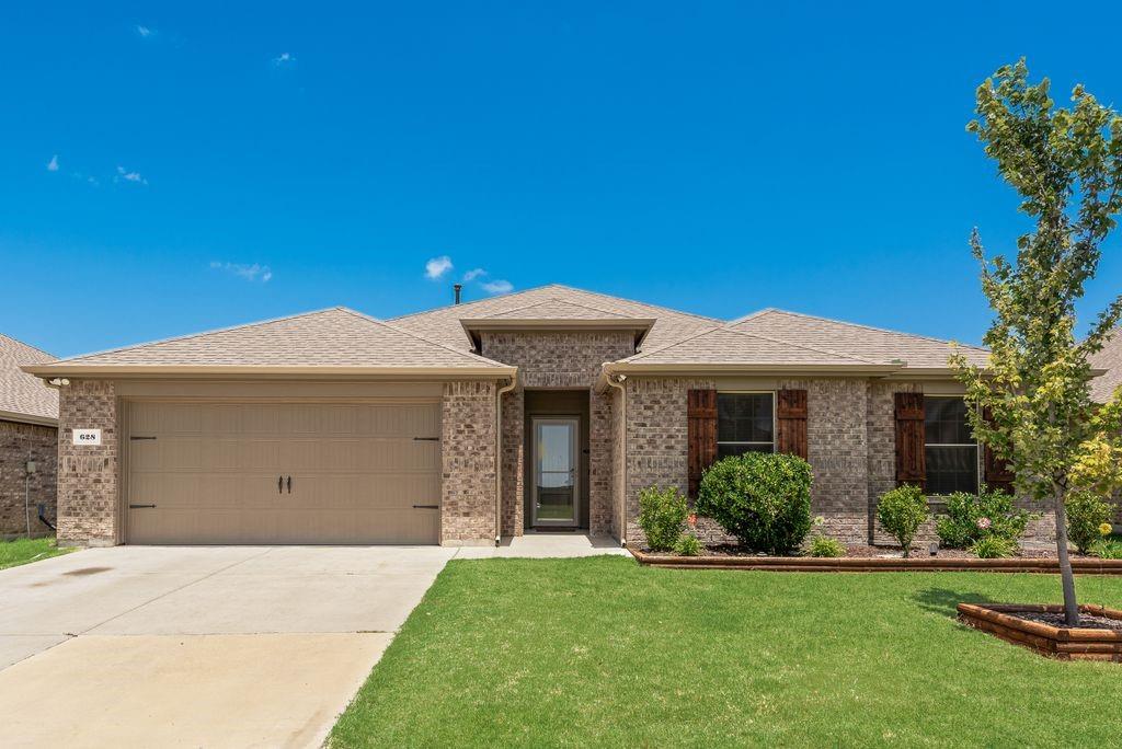628 Bunker Hl Road Fate, TX 75189 - Photo 2 of 38 You won't need to work on the landscaping - it's beautiful both front and back.