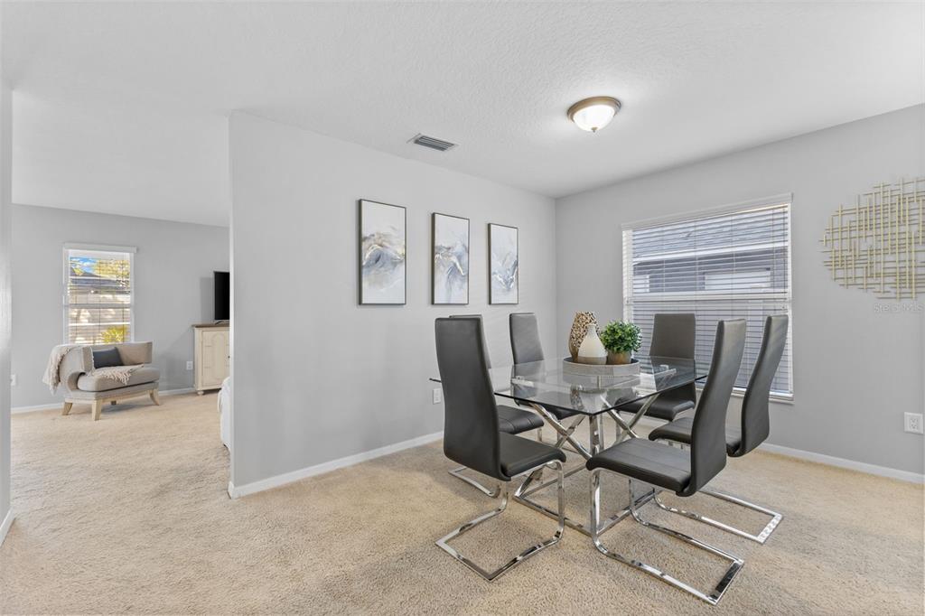 1422 Trail Boss Lane Brandon, FL 33511 - Photo 5 of 31 a workspace with furniture and a window