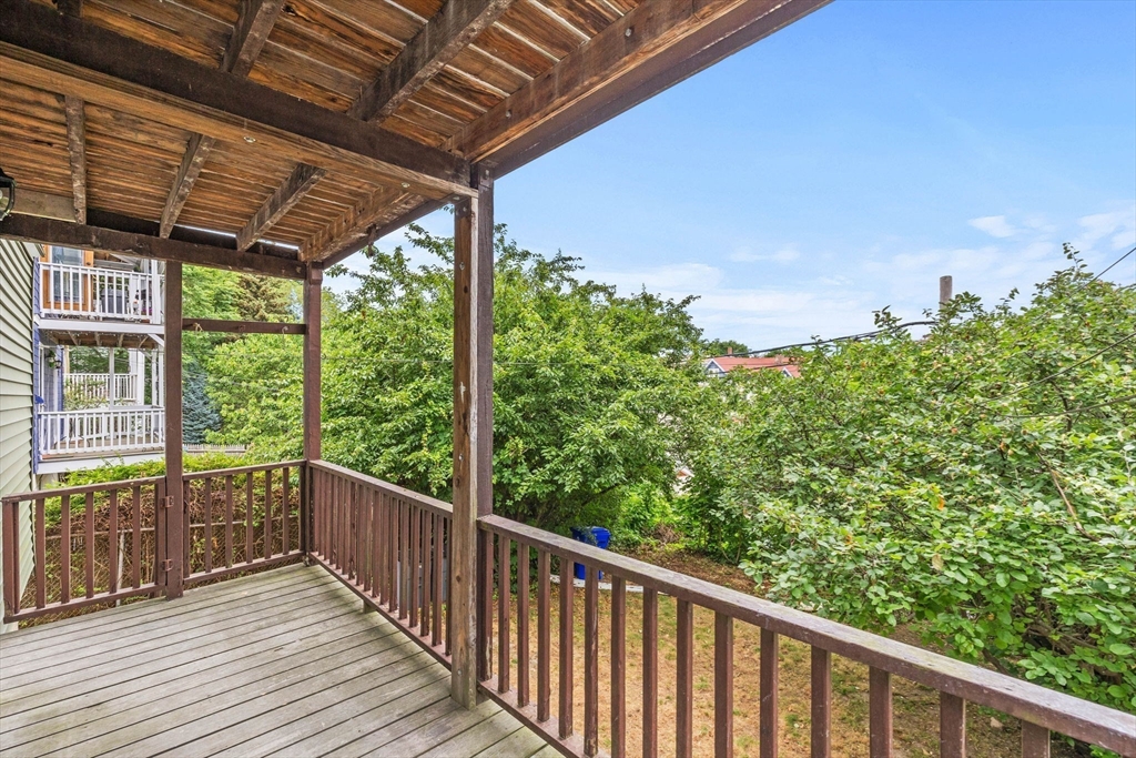 170 Calumet Street, Unit 1 Boston, MA 02120 - Photo 19 of 21 a view of a balcony with wooden floor