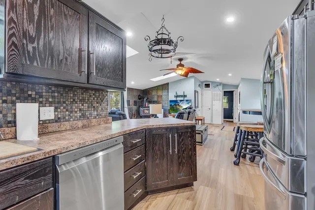 $325,000 | 585 Norvell Beach Drive, Brooklyn, MI 49230