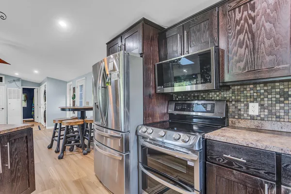 $325,000 | 585 Norvell Beach Drive, Brooklyn, MI 49230