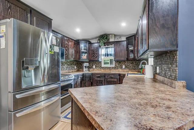 $325,000 | 585 Norvell Beach Drive, Brooklyn, MI 49230