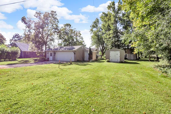 $325,000 | 585 Norvell Beach Drive, Brooklyn, MI 49230