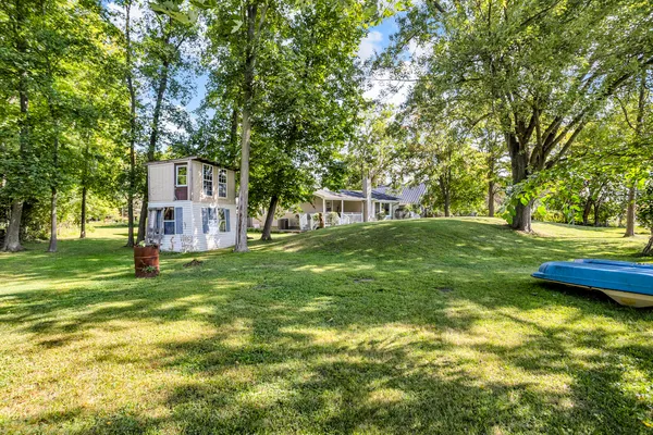 $325,000 | 585 Norvell Beach Drive, Brooklyn, MI 49230