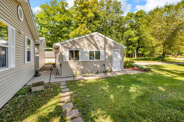 $325,000 | 585 Norvell Beach Drive, Brooklyn, MI 49230
