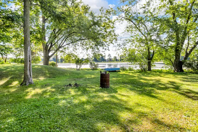 $325,000 | 585 Norvell Beach Drive, Brooklyn, MI 49230