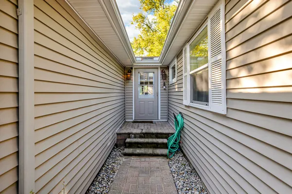 $325,000 | 585 Norvell Beach Drive, Brooklyn, MI 49230
