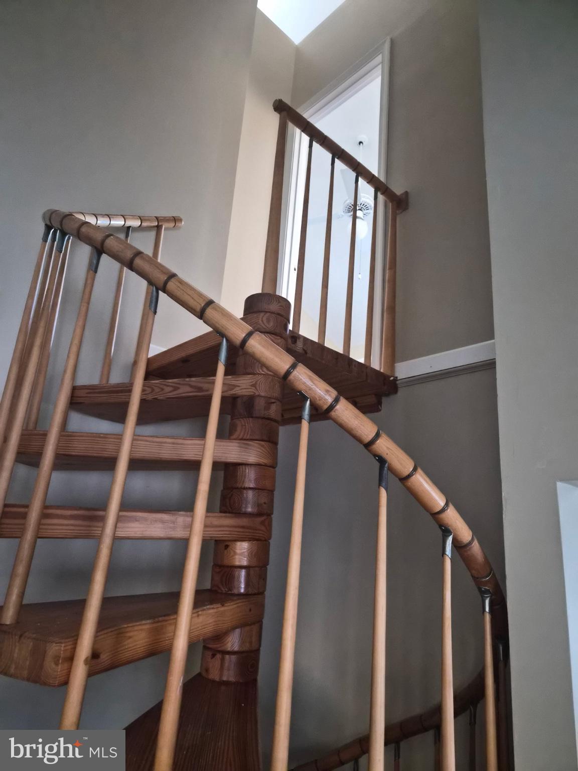 7 Hunters Point Millsboro, DE 19966 - Photo 38 of 74 Elegant spiral staircase leading up.